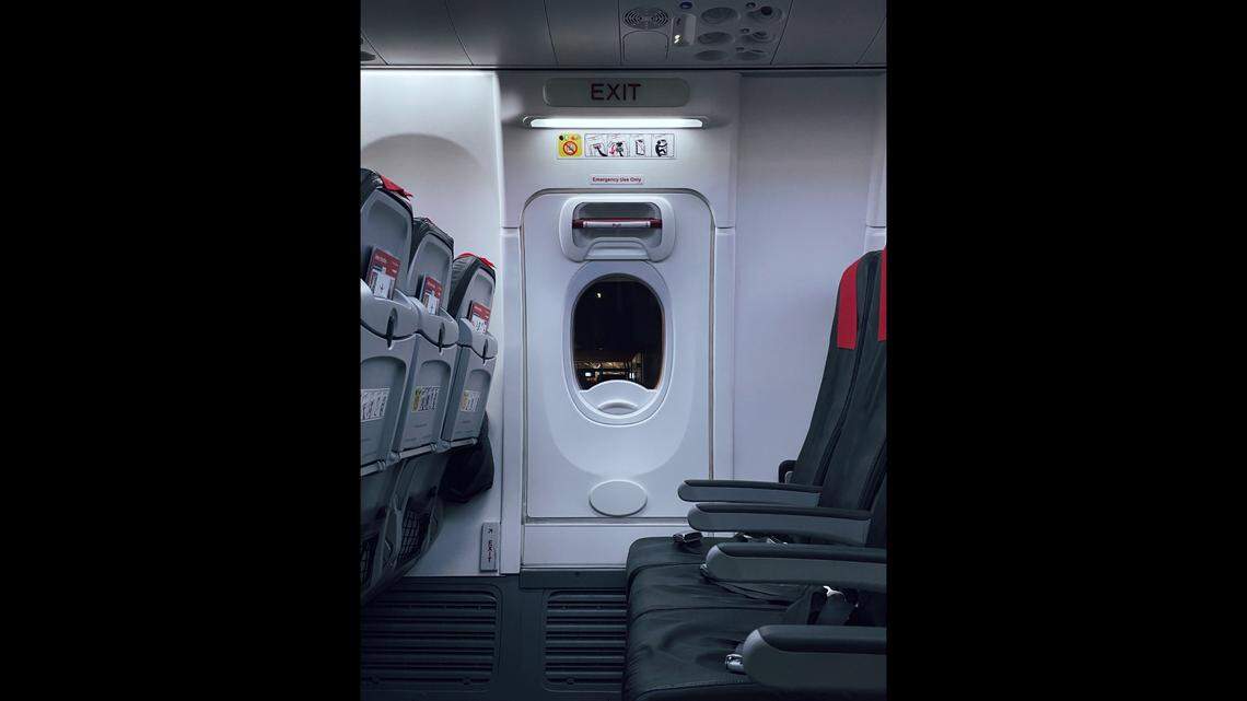 A 44-year-old man is accused of opening an emergency exit on a plane at a Minnesota airport and running away from police, officials say.