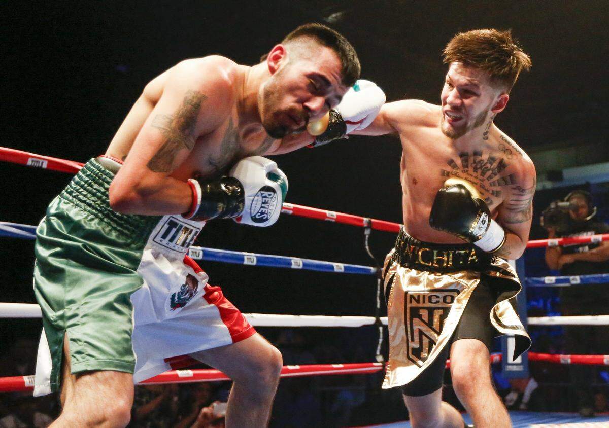 Nico Hernandez (right) fought Jose Rodriguez in a flyweight bout at the KO Night Boxing event at Hartman Arena last June.