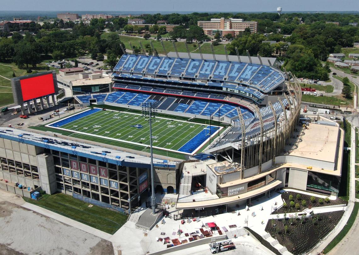 The new artificial turf at Kivisto Field, with its blue end zones and waving wheat design, has been installed at David Booth Kansas Memorial Stadium.