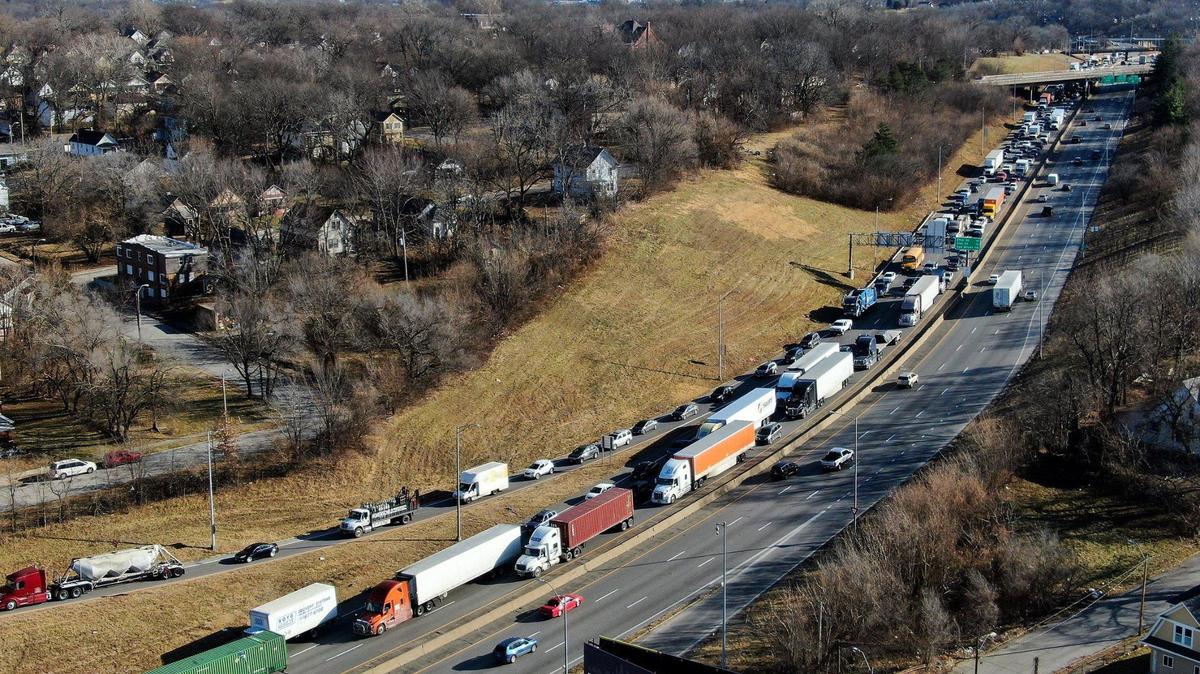 Westbound Interstate 70 near 18th Street in Kansas City was closed due to an early morning fire underneath a bridge where a body was found in a homeless encampment Thursday, Jan. 13, 2022. Motorists were backed up and many exited the highway at 23rd Street. Eastbound I-70 remained open.
