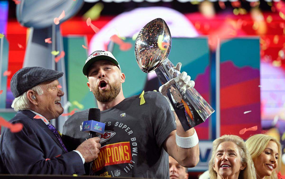 Broadcaster Terry Bradshaw interviews Kansas City Chiefs tight end Travis Kelce after the Chiefs’ victory in Super Bowl LVII. Kelce announced days later, on Feb. 16, that he will be hosting Saturday Night Live.