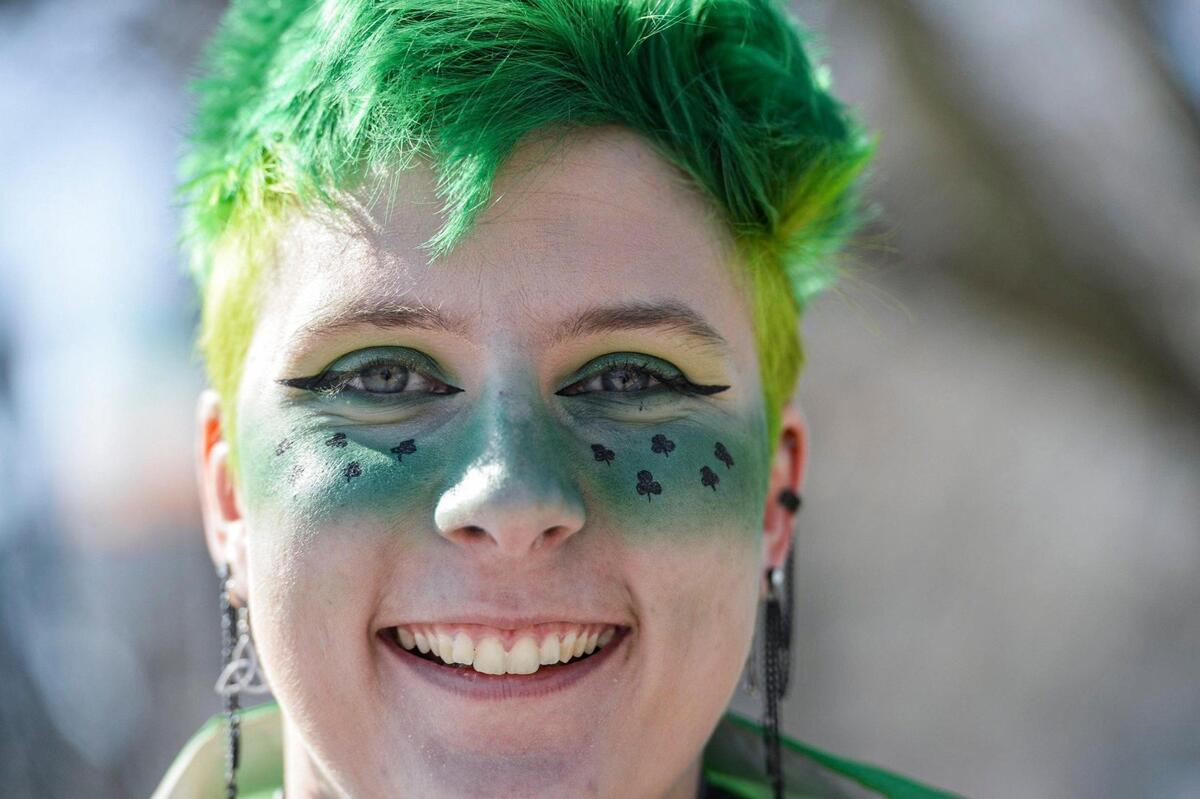 Tori McDonald-Kershaw was decked out in green Friday, March 17, 2023, during the annual St. Patrick’s Day parade in Kansas City.