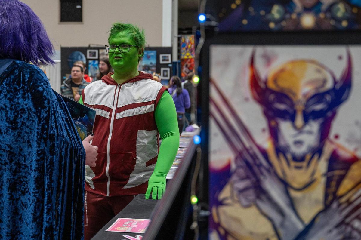 Logan Taylor, dressed as the character Beast Boy from the show ‘Young Justice,’ attends the 25th anniversary of Planet Comicon at the Kansas City Convention Center on Saturday, March 9, 2024, in Kansas City.