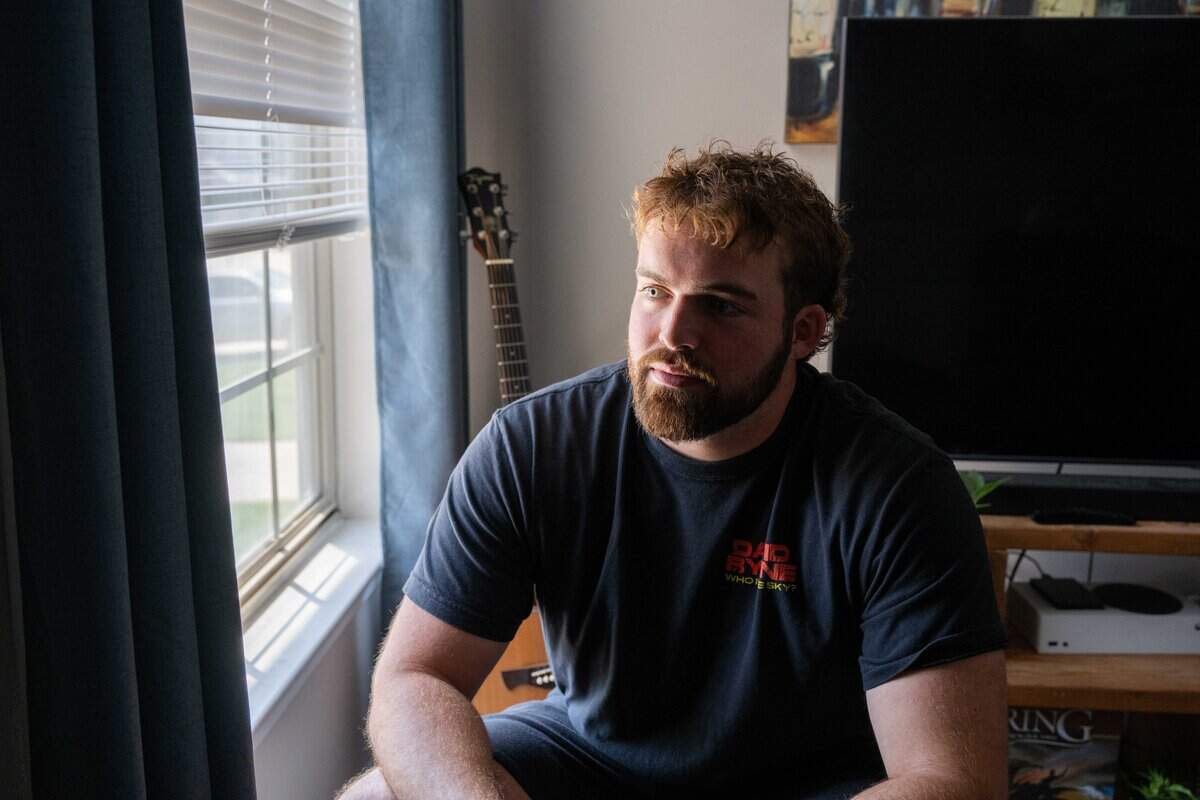 Carter Black, a teacher in the Blue Valley School District, at his home on Thursday, July 9, 2026. A chemistry teacher at Blue Valley West, Black has faced his own struggles with finding affordable housing near his place of work.