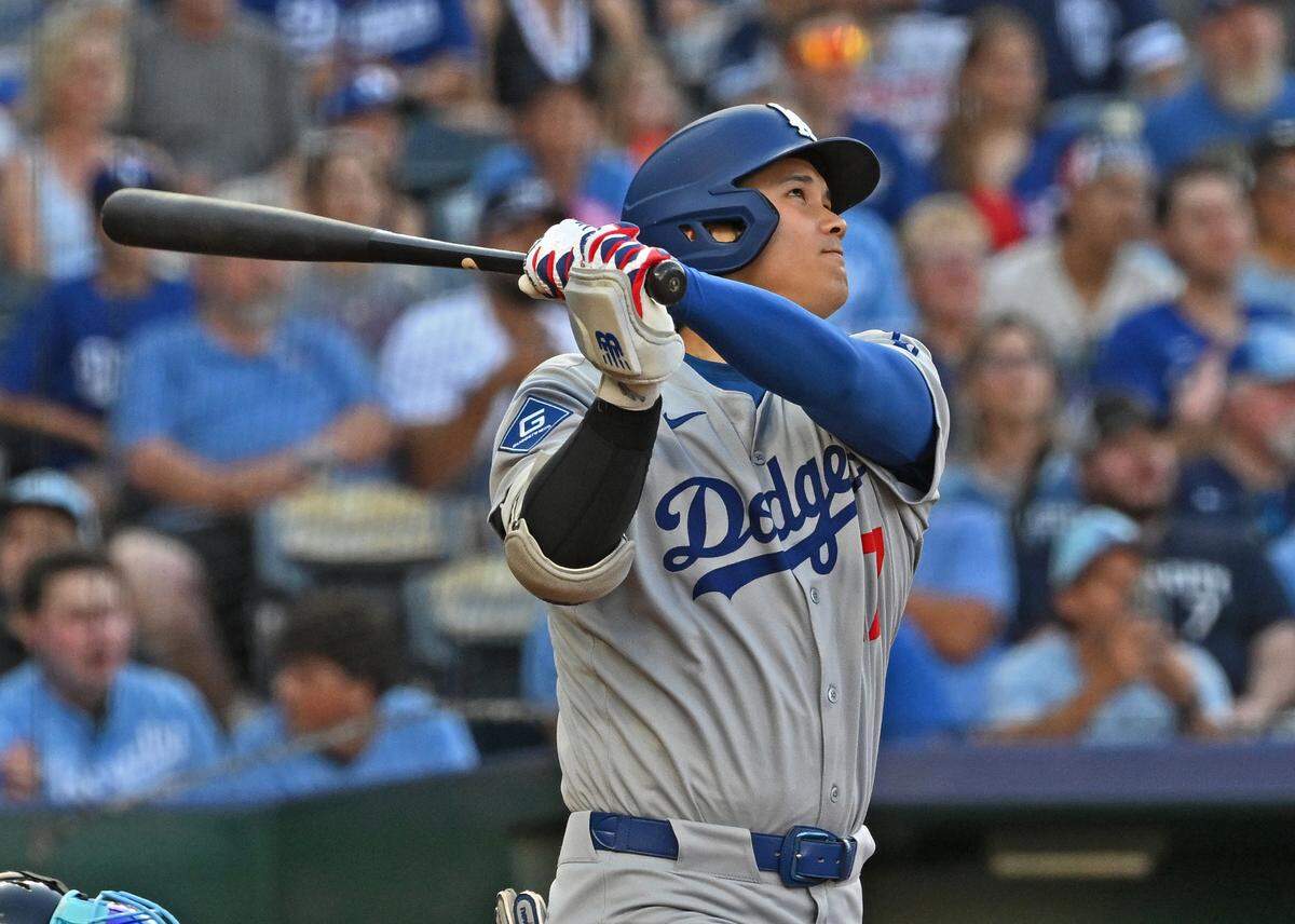 Los Angeles Dodgers designated hitter Shohei Ohtani (17) hits a solo home run in the first inning against the Kansas City Royals at Kauffman Stadium on June 27, 2025.