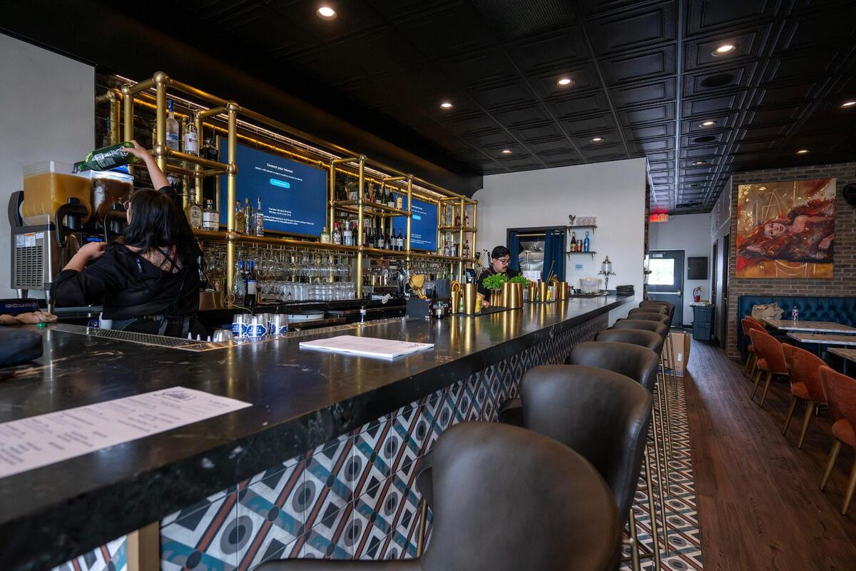 Stools line the bar counter at Gilda’s Bar de Tapas on Thursday, July 17, 2025, in Shawnee.