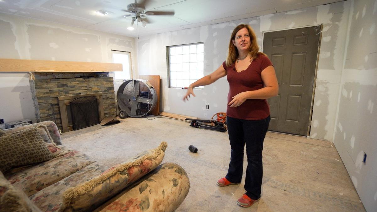 When Laurie Schwab bought her dollar home, its living room had a caved-in floor.