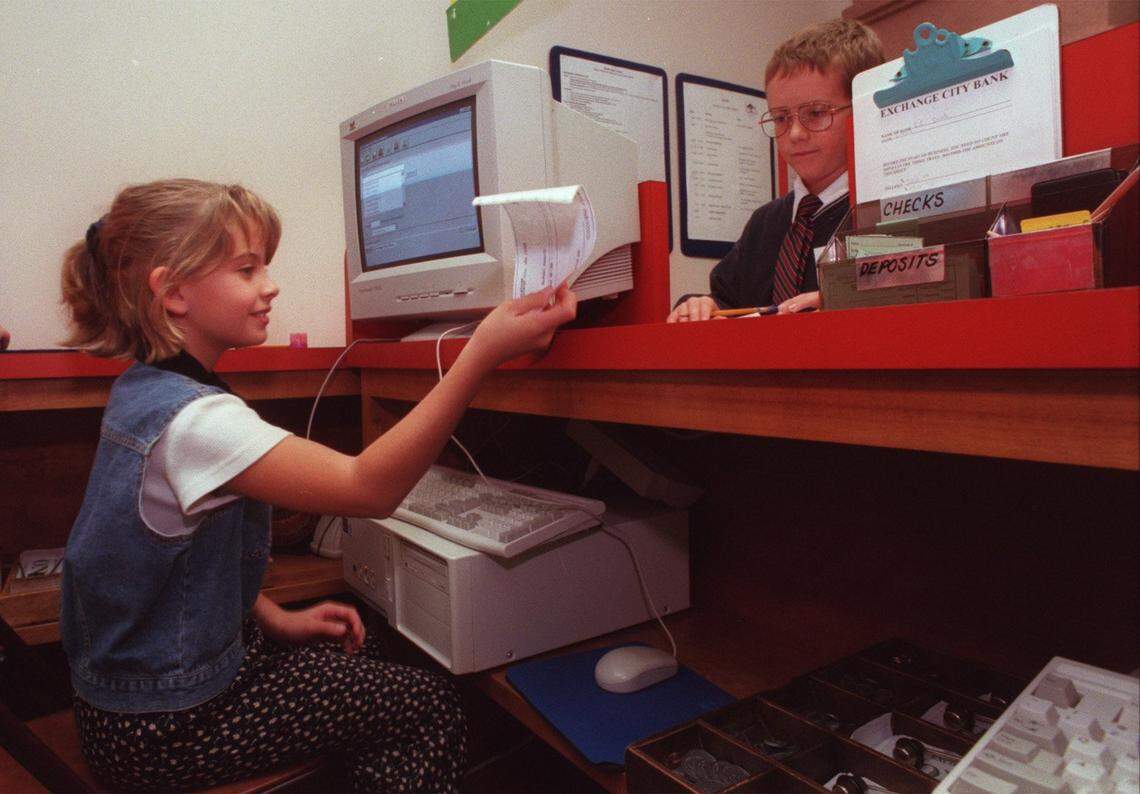 In 1998, an Exchange City bank teller took a deposit from a fellow kid. Fifth graders learned how to write checks and use debit cards as part of Exchange City’s curriculum.