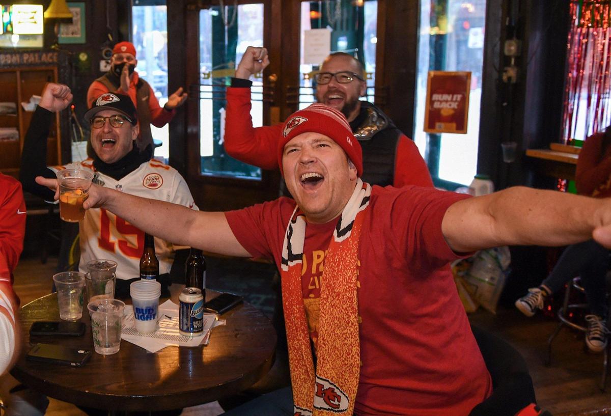 Gathered at KellyÕs Westport Inn, Chiefs fans Jason Grill, Mark Miller and Matt Moriarity reacted as they cheered on the Chiefs in the Super Bowl against the Tampa Bay Buccaneers on Sunday, Feb. 7, 2021, in Tampa.
