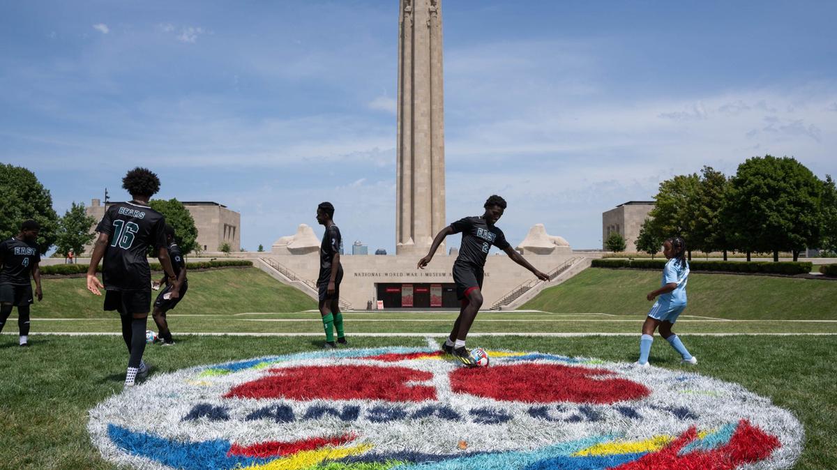 Players from the East High School soccer team kick a ball around at the National WWI Museum and Memorial on Aug. 14. The venue was announced as the location of the FIFA Fan Festival for the 2026 World Cup matches in Kansas City.