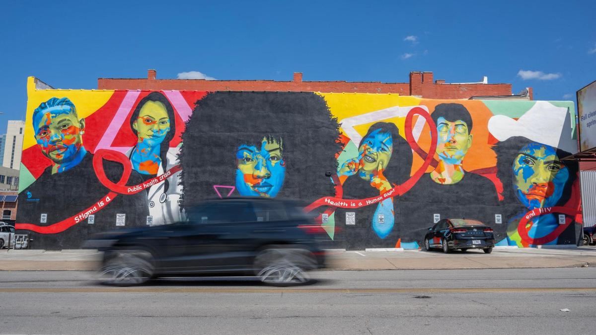 Isaac Tapia and Rodrigo “Rico” Alvarez created the mural “World AIDS Day” at 18th and Walnut streets.