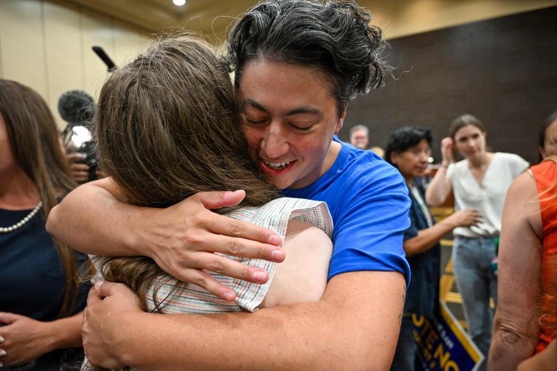 Iman Alsaden, Chief Medical Officer for Planned Parenthood Great Plains hugged Rachel Sweet, campaign manager for Kansans for Constitutional Freedom, as they celebrated a victory at the polls Tuesday, August 2, 2022, at the Overland Park Convention Center, 6000 College Blvd. The group backed a ‘No’ vote on the constitutional amendment, which if passed, removes the right to an abortion from the Kansas constitution.