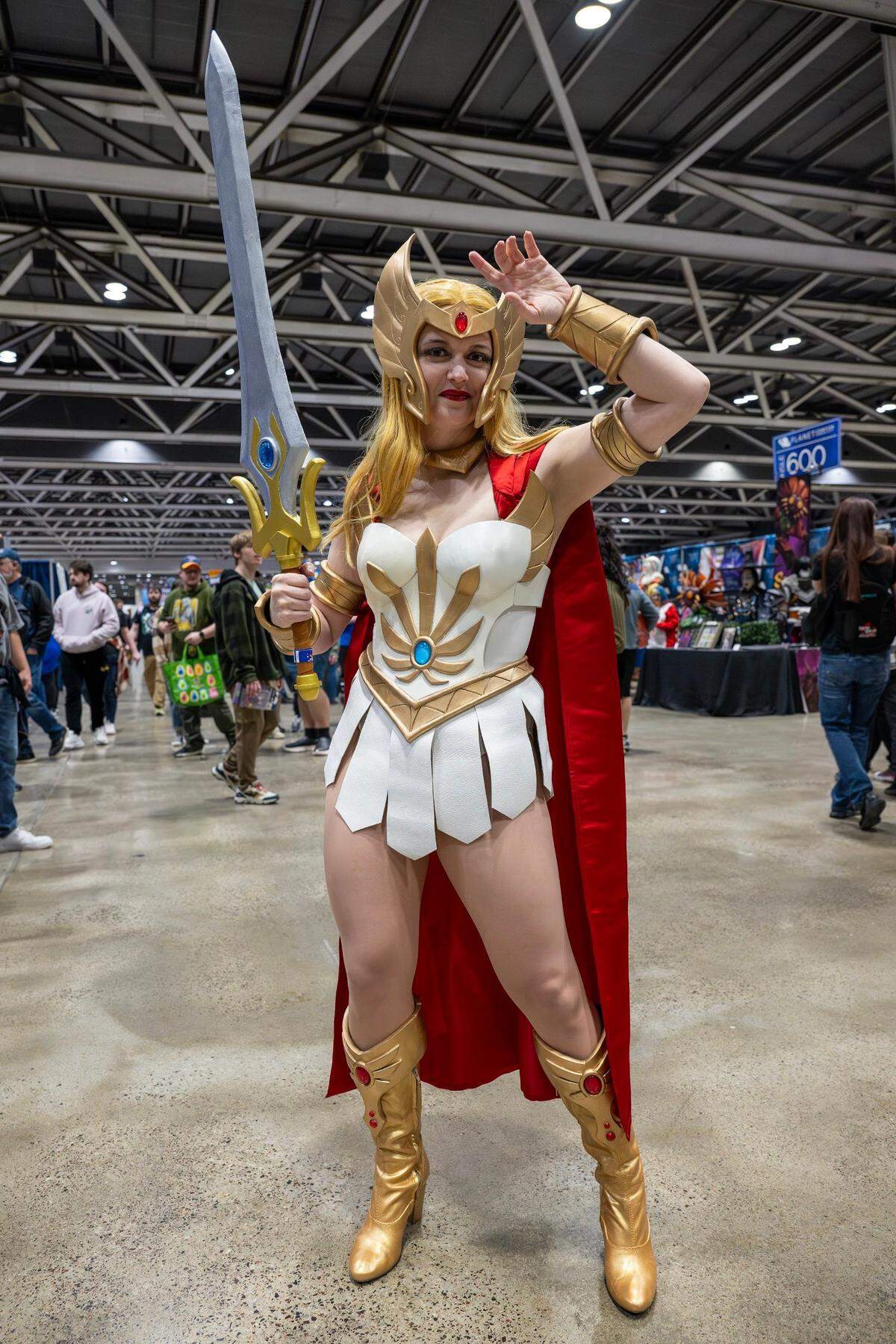 Amanda Fehlner cosplays as She-Ra, Princess of Power, during Planet Comicon at the Kansas City Convention Center on Friday, March 21, 2025.