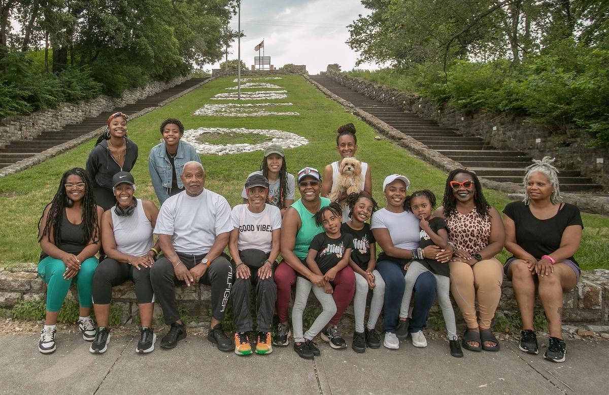 Nadine Farris organizes weekly walks at the Paseo Stairs every Sunday morning. Back row, Left to right: Destiny Martin, Unique Martin, Kellen Walker and Sandra Yates and her dog “Bear”. Front row, left to right: Delia Paerl, Royce Martin, Bennie Ford, Nadine Farris, Nicole Price, Cherish MArtin, 7, Harmony Martin, 11, Faith Martin, 5, mom Porchea Martin, group founder Erika Griffin and Rosylin Washington.