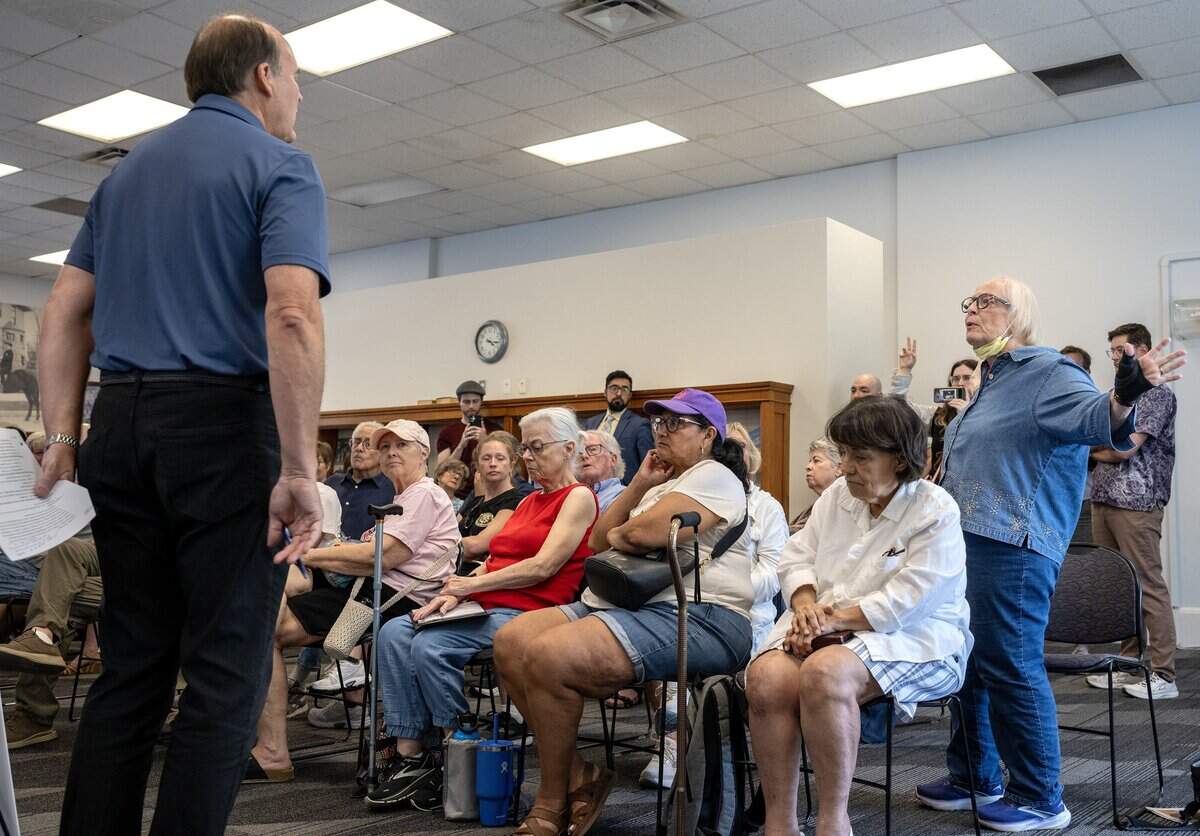 A Midtown resident speaks during a public meeting about the proposed Linwood Business Center zoning changes at the Westport Library on Tuesday, July 7, 2026, in Kansas City.