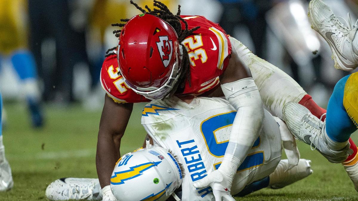 Kansas City Chiefs linebacker Nick Bolton (32) was in on a sack on Los Angeles Chargers quarterback Justin Herbert (10) in the second half on Sunday, Dec. 8, 2024, at GEHA Field at Arrowhead Stadium.