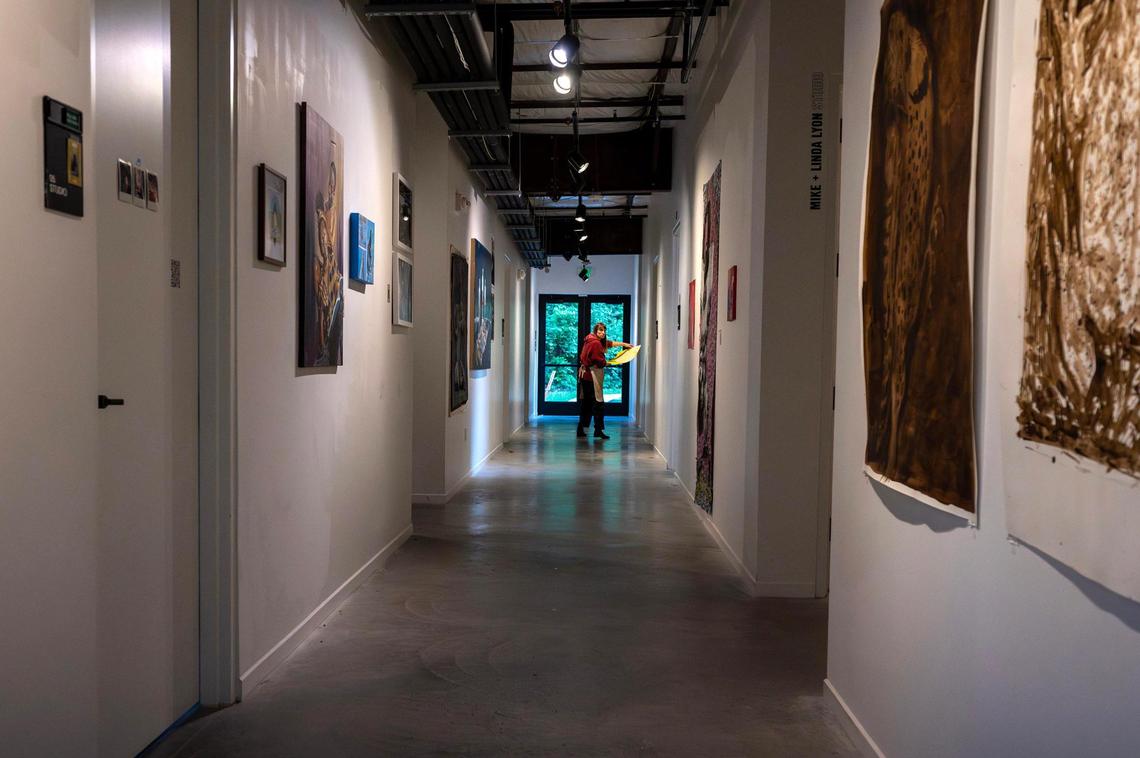 Workrooms line a hallway at Charlotte Street Foundation.