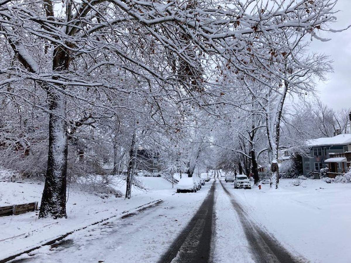 A snowy street scene at Walnut and 36th St. in the Old Hyde Park neighborhood of Kansas City, after a winter storm left several inches of snow on Jan. 8 and 9, 2024.