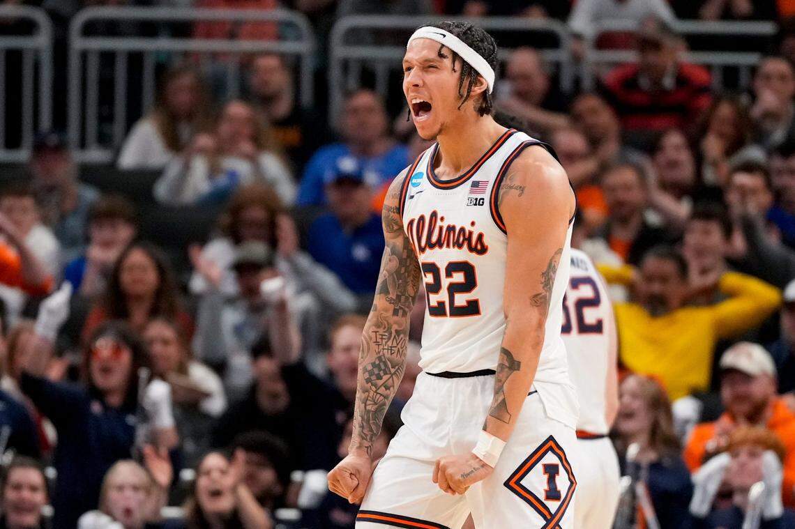 Illinois guard Tre White (22) celebrates after sinking a 3-point basket in the second half of an NCAA Tournament first-round game against Xavier at Fiserv Forum in Milwaukee on Friday, March 21, 2025.