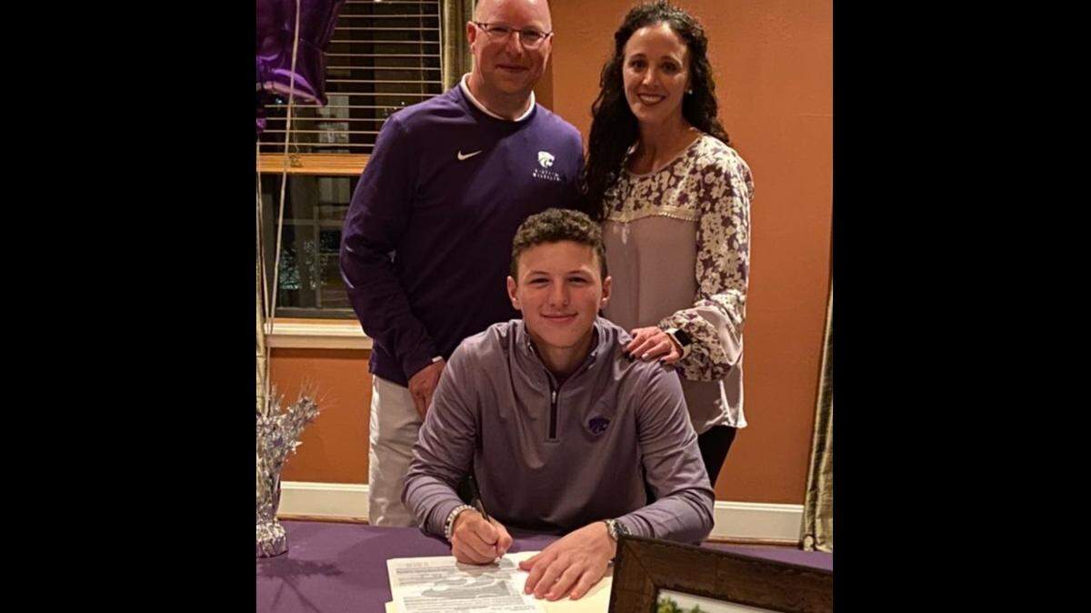 Nicklaus Mason, seated signing his letter of intent to play at K-State, won the Class 5A golf championship for 2021 in the state of Kansas Tuesday in Newton.