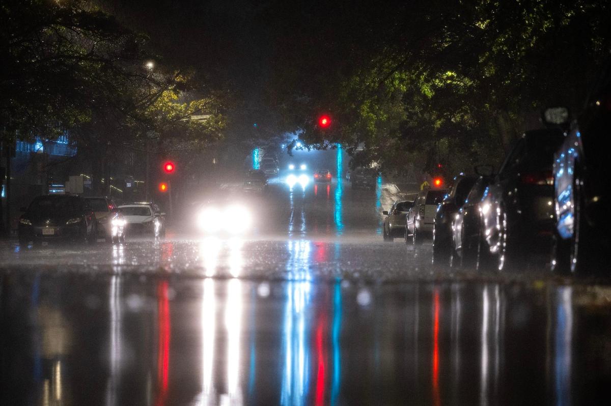 Heavy rain begins to fall along Armour Boulevard on Wednesday, Oct. 30, 2024, in Kansas City.
