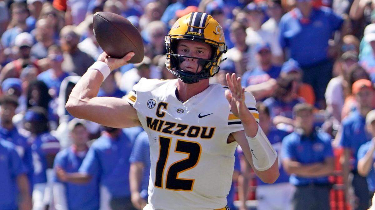 Missouri Tigers quarterback Brady Cook was 22 of 30 for 220 yards, with no touchdowns and two interceptions, against the Florida Gators Saturday in Gainesville, Fla.