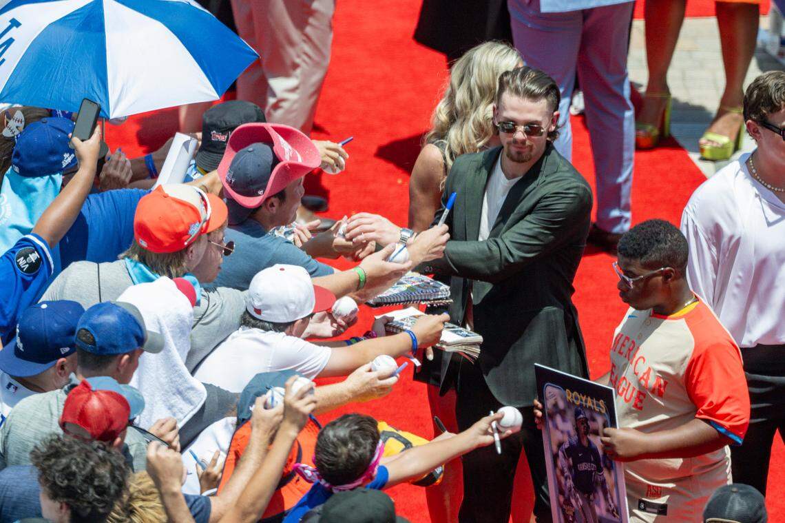 American League shortstop Bobby Witt Jr. of the Kansas City Royals (7) walks the red carpet before the 2024 MLB All-Star game at Globe Life Field on July 16, 2024.