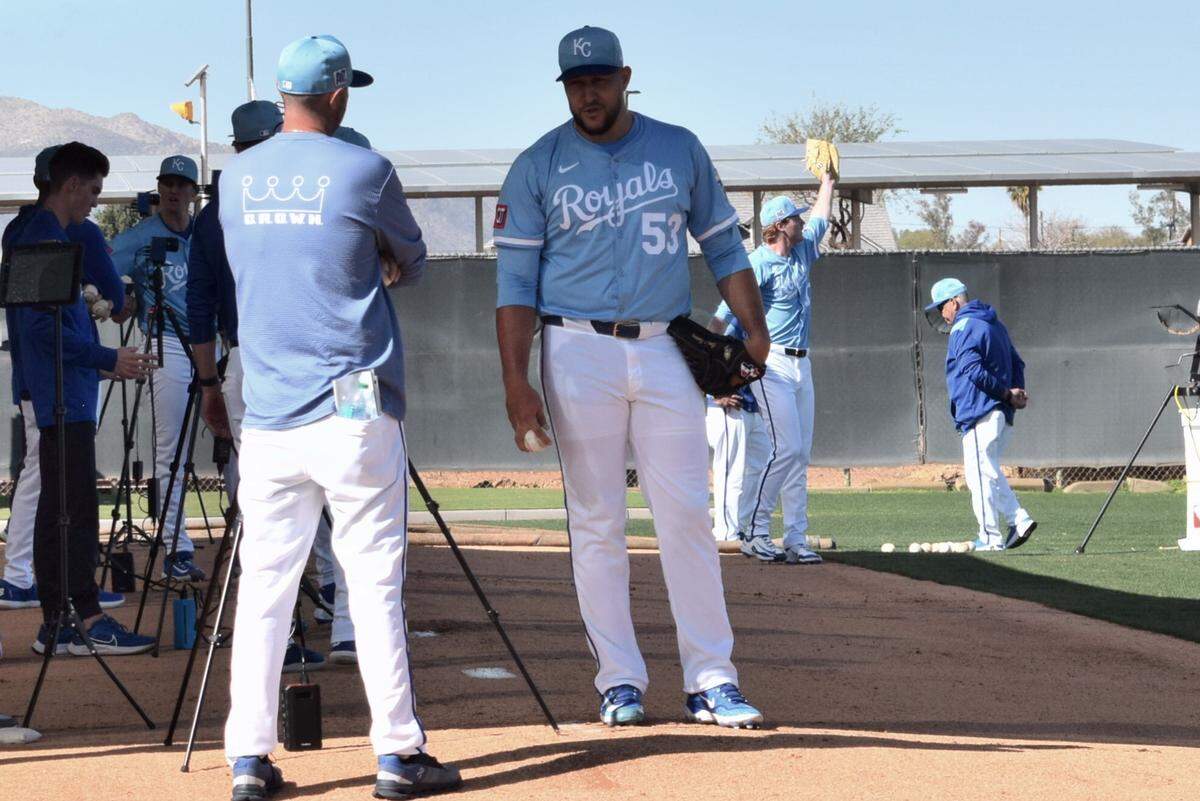Kansas City Royals reliever Carlos Estevez talks with Royals bullpen coach Mitch Stetter during his bullpen session on Friday, Feb. 14 2025 at the club’s spring training complex in Surprise, Arizona.