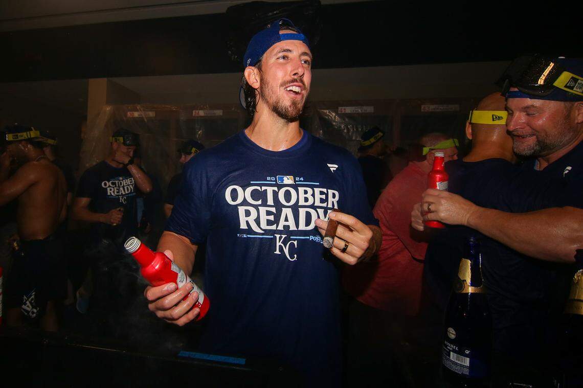 Kansas City Royals starting pitcher Michael Lorenzen (24) celebrates after clinching a wild card playoff birth after a game against the Atlanta Braves at Truist Park.