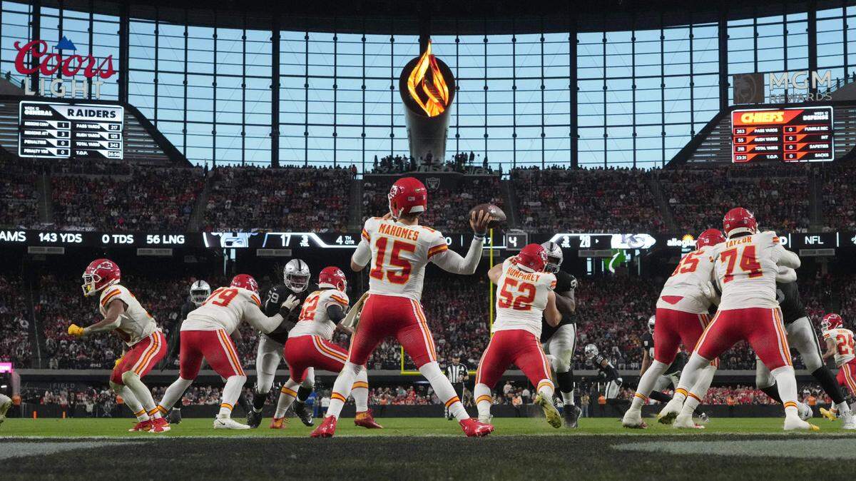Kansas City Chiefs quarterback Patrick Mahomes (15) throws the ball against the Las Vegas Raiders in the second half at Allegiant Stadium on Nov. 26, 2023.