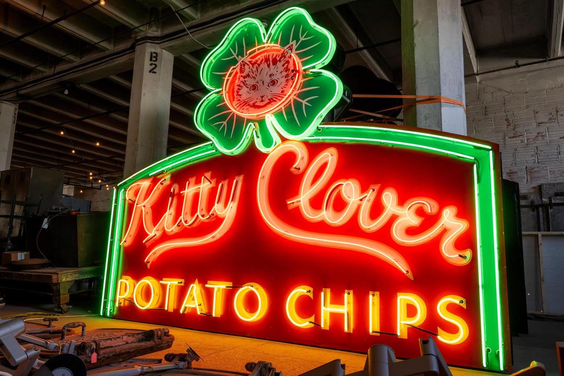 A restored Kitty Clover Potato Chips neon sign glows inside a storage facility not far from Pennway Point. The Lumi Neon Museum is to be part of the Pennway Point entertainment district whose construction continues to be delayed. The sign was refurbished in collaboration with Midtown Signs and Element 10.