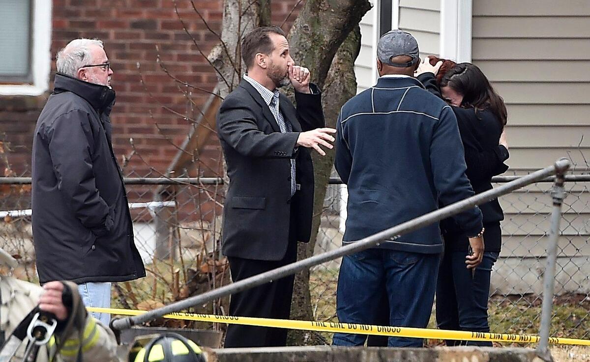 At the scene of a deadly house fire Thursday, loved ones continued to arrive and console one another.