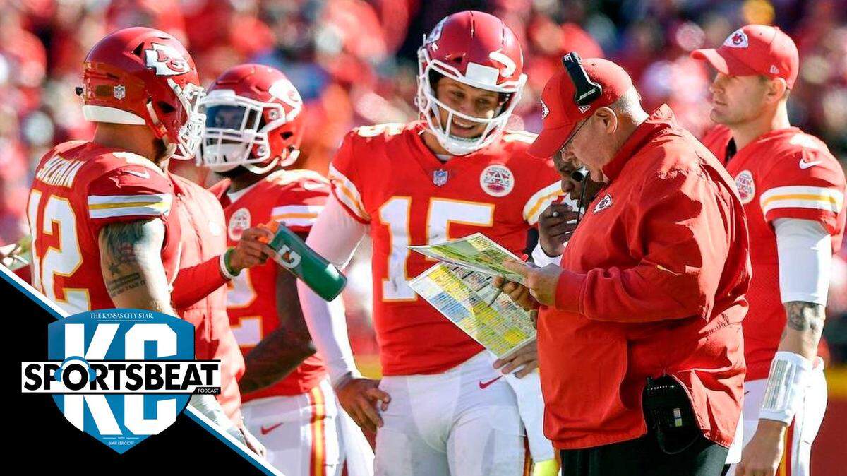 Kansas City Chiefs head coach Andy Reid looks over his play sheet as quarterback Patrick Mahomes looks on during a football game on October 28, 2018 at Arrowhead Stadium in Kansas City, Mo.