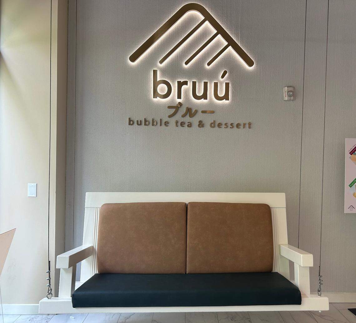 Customers can enjoy their boba and desserts from a comfy swing near the entrance.