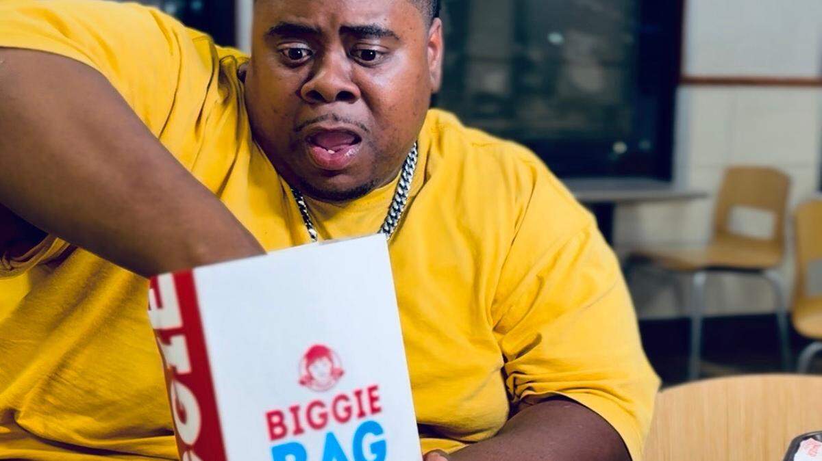 A Kansas City content creator, Clarence Lomax turned viral parody songs into a Wendy’s Biggie Bag jingle, starring in the commercial and boosting local businesses and exposure.
