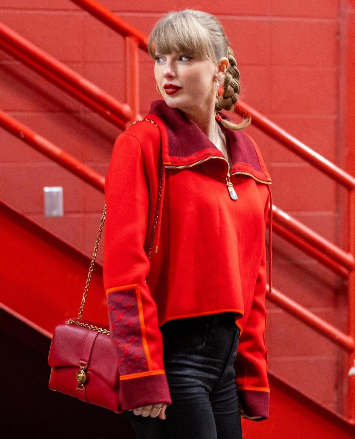 Pop star Taylor Swift walks through a tunnel to attend the Kansas City Chiefs’ game against the Las Vegas Raiders on Friday, Nov. 29, 2024, at GEHA Field at Arrowhead Stadium.