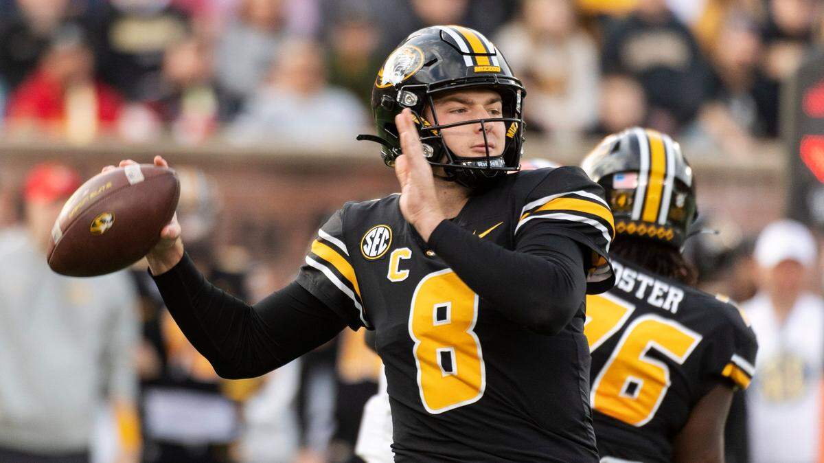 Missouri quarterback Connor Bazelak looks to pass during the first quarter of an NCAA college football game against Florida, Saturday, Nov. 20, 2021, in Columbia, Mo. (AP Photo/L.G. Patterson)