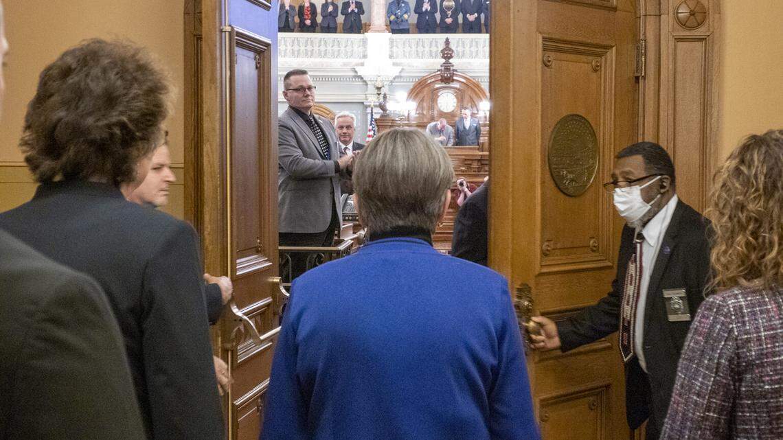 Kansas Gov. Laura Kelly enters the Kansas House of Representatives to deliver her 2023 state of the state address.
