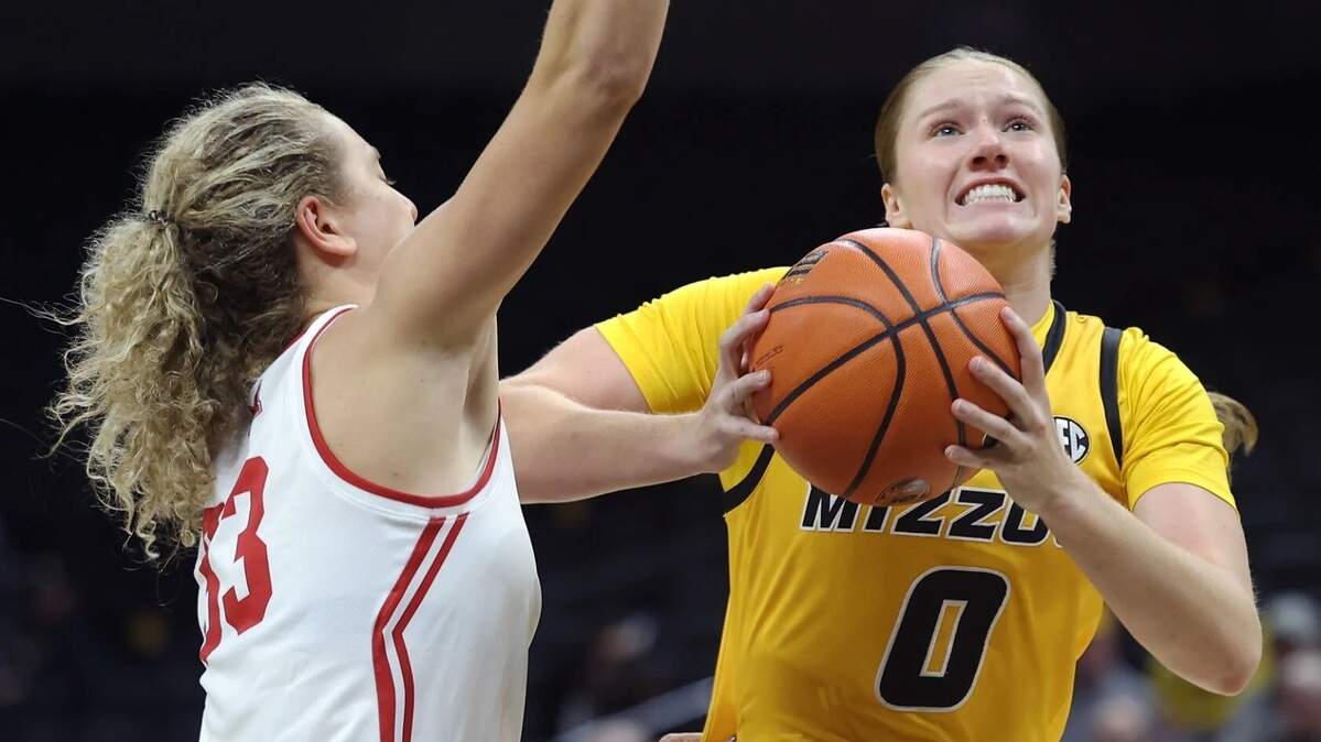 Missouri Tigers guard Grace Slaughter, right, drives past Maryville forward Adylan Ayer during an exhibition women’s basketball game on Tuesday, Oct. 28, 2025, at Mizzou Arena in Columbia.