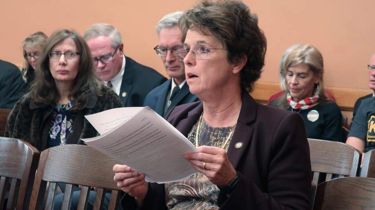 Kansas state Sen. Carolyn McGinn, R-Sedgwick, asks questions during a meeting of GOP senators Monday at the Statehouse in Topeka. Lawmakers are meeting in special session to consider measures to financially protect workers who face losing their jobs because of federal COVID-19 vaccine mandates.