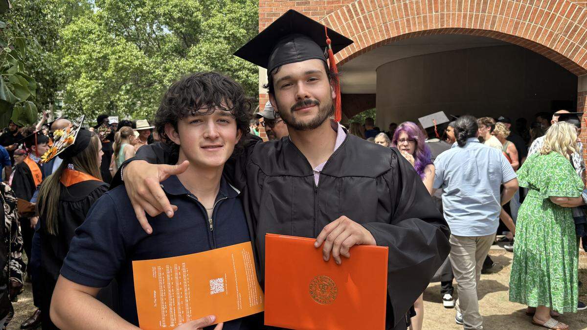 Tyler Kelly (left) with his brother, Erik Kelly (right) at Erik Kelly’s graduation.