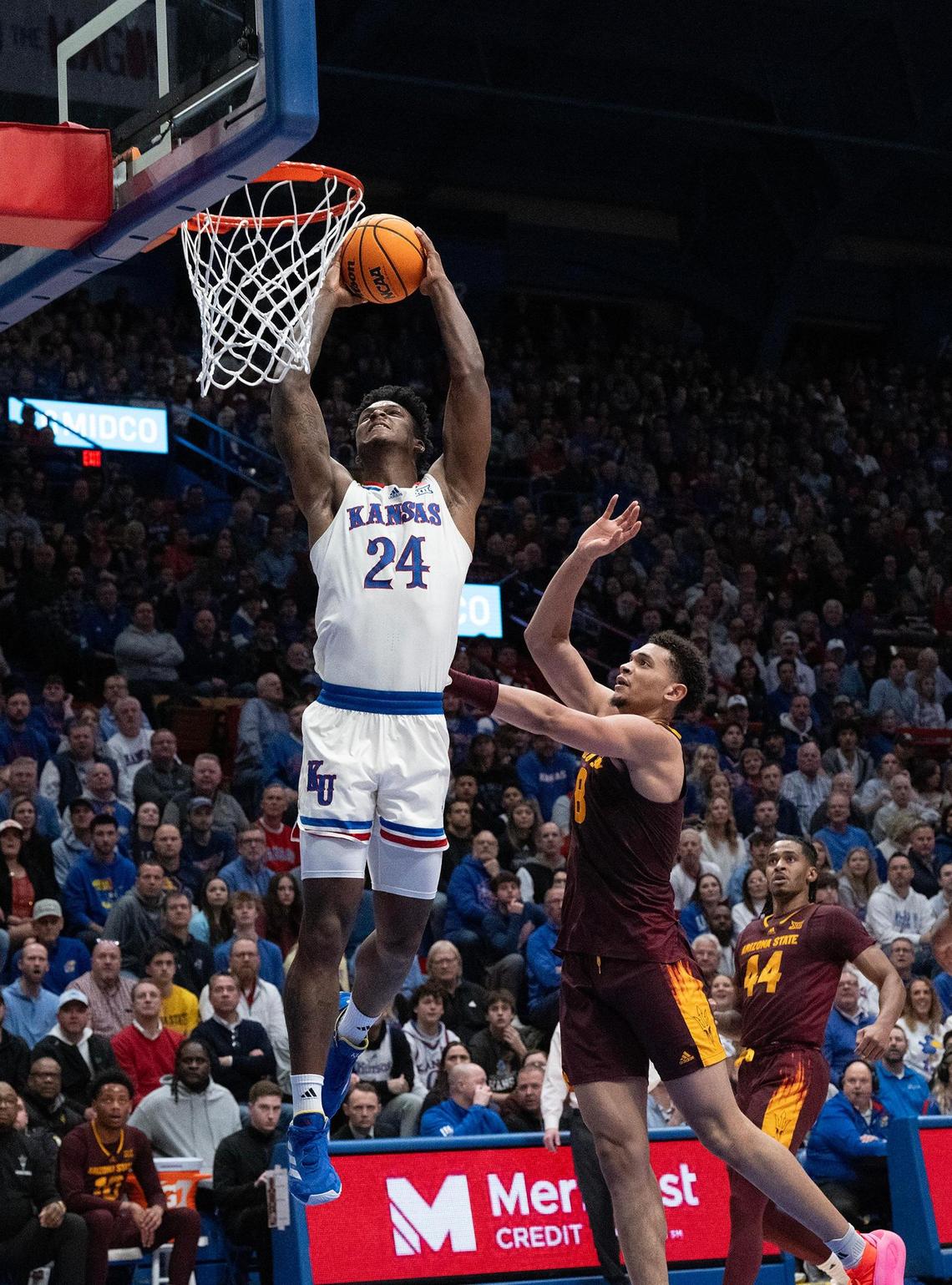 Kansas Jayhawks forward KJ Adams Jr. (No. 24) dunks it during a college basketball game against the Arizona State Sun Devils at Allen Fieldhouse on Wednesday, Jan. 8, 2025, in Lawrence, Kansas.