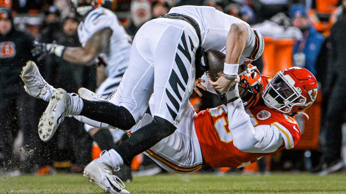 Kansas City Chiefs defensive end Frank Clark sacks Cincinnati Bengals quarterback Joe Burrow in the first quarter during the AFC Championship Game Sunday, Jan. 29, 2023, at GEHA Field at Arrowhead Stadium.
