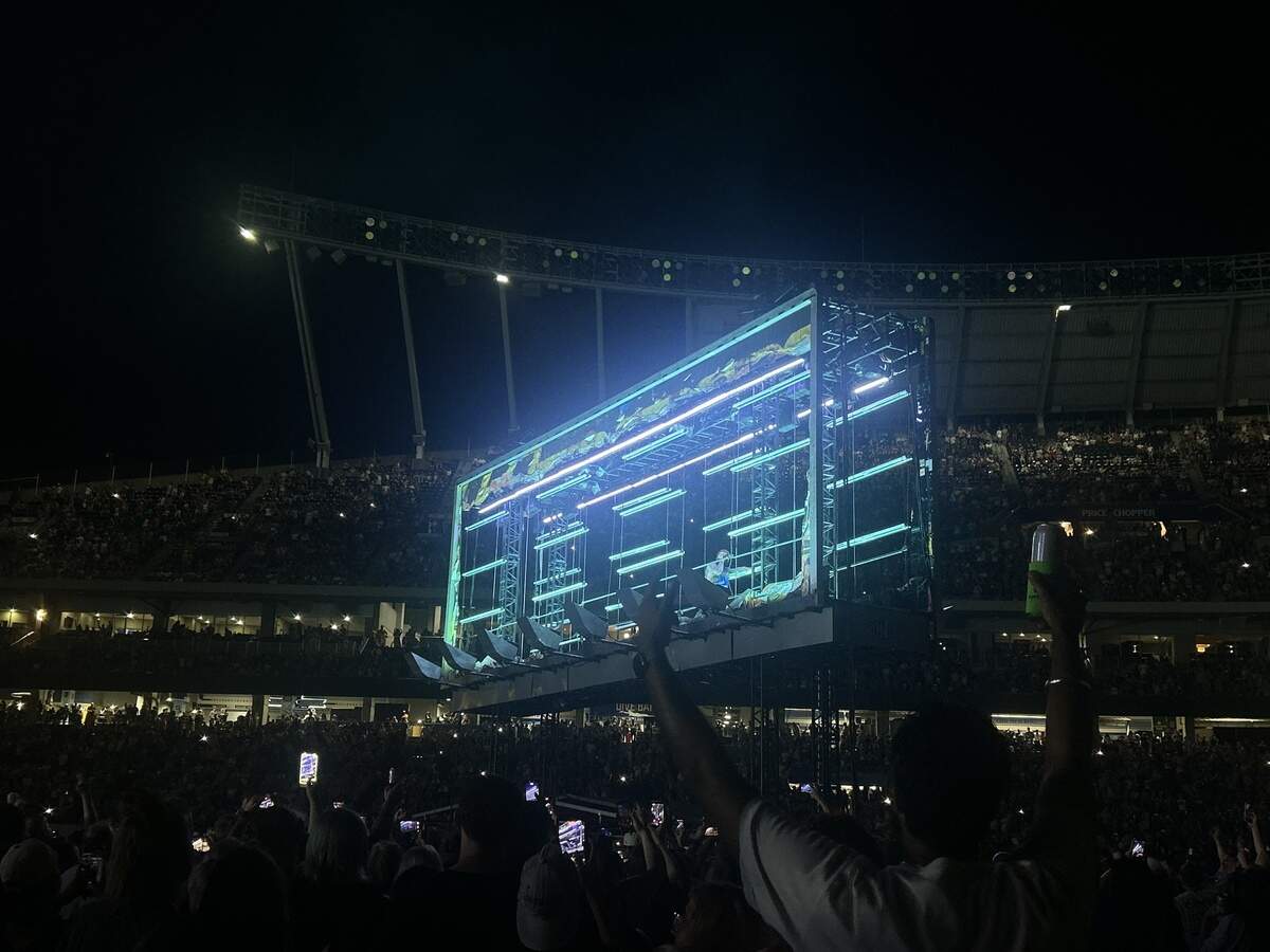 Post Malone hovered over a crowd in a secondary stage for his last song. “Congratulations,” on Wednesday night at Kauffman Stadium for his Kansas City leg of The Big Ass Stadium Tour Part 2.