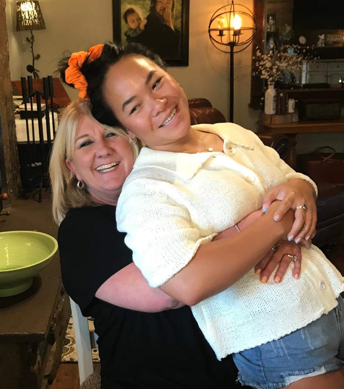 Shelly Shepherd, left, hugging adopted daughter Haven, says she and husband Rob “rescued her. But in so many ways she rescued us, too.”