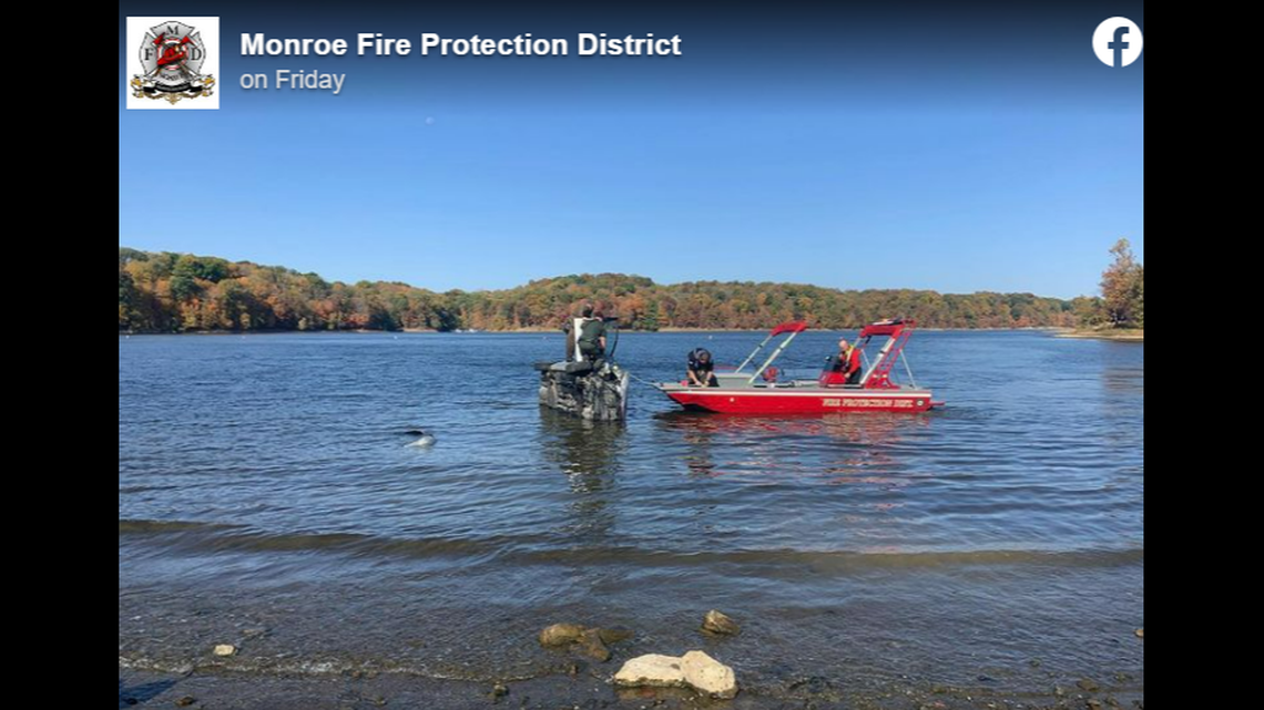 Rescue crews brought a boat out the the vehicle and brought the injured driver aboard.