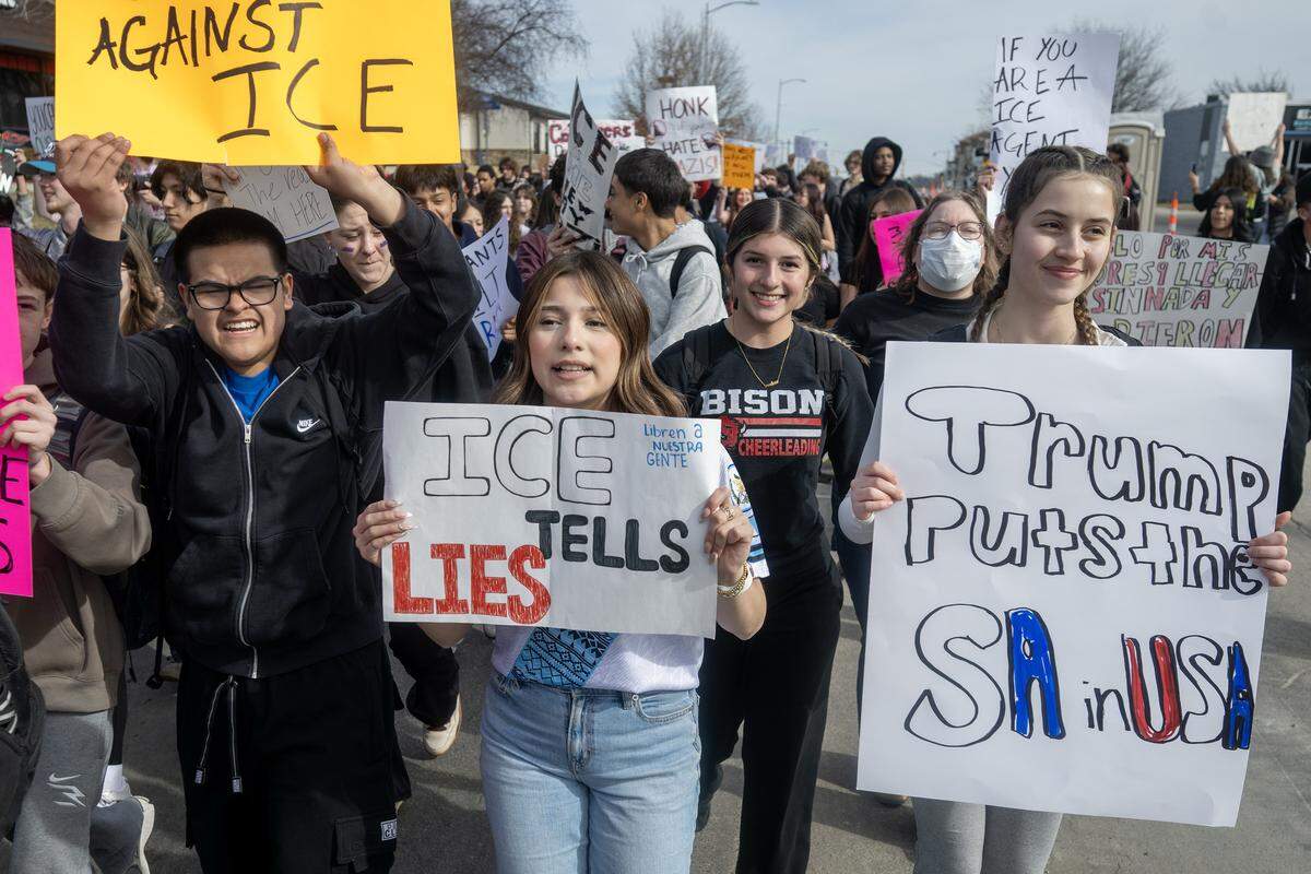 Students at Shawnee Mission North High School marched in protest of ICE and the Trump administration's policies along Johnson Drive on Wednesday, February 11, 2026, in Overland Park.
