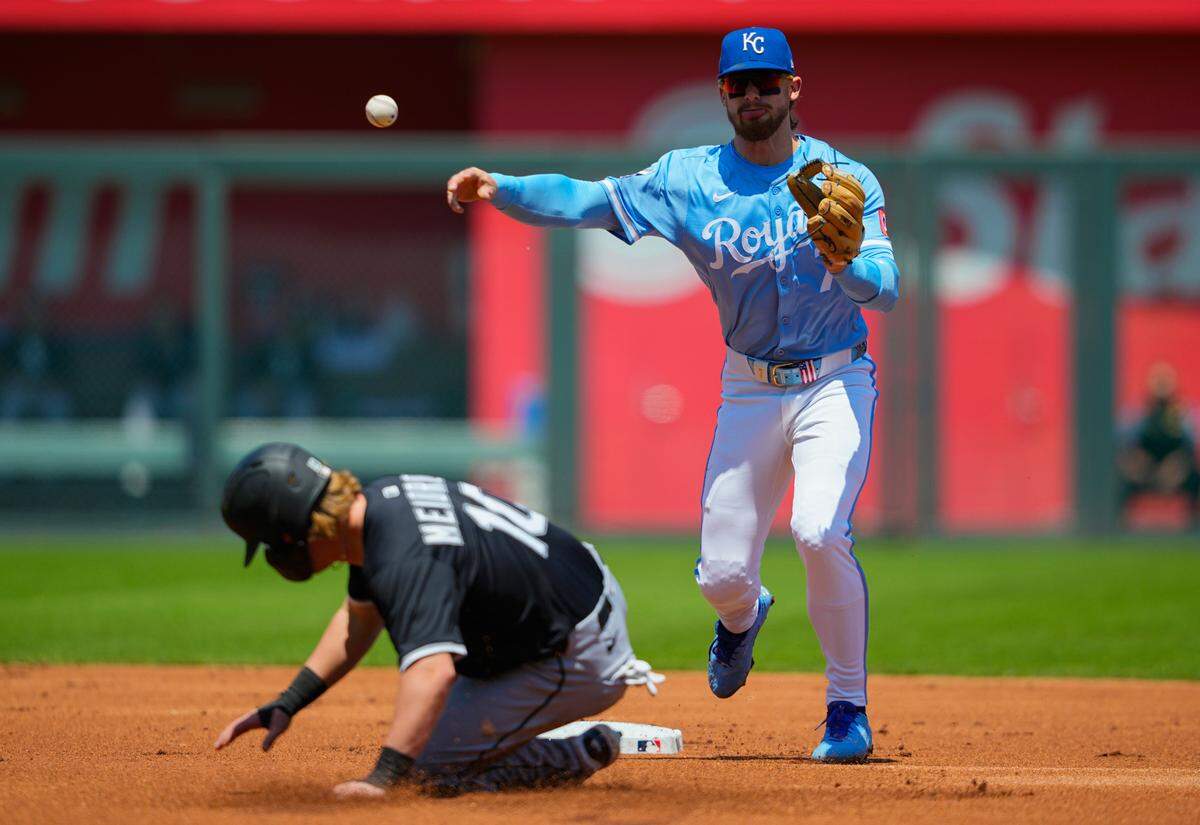 Royals shortstop Bobby Witt Jr. throws to first base after forcing out Chicago White Sox shortstop Chase Meidroth on Thursday, May 8, 2025 at Kauffman Stadium in Kansas City.