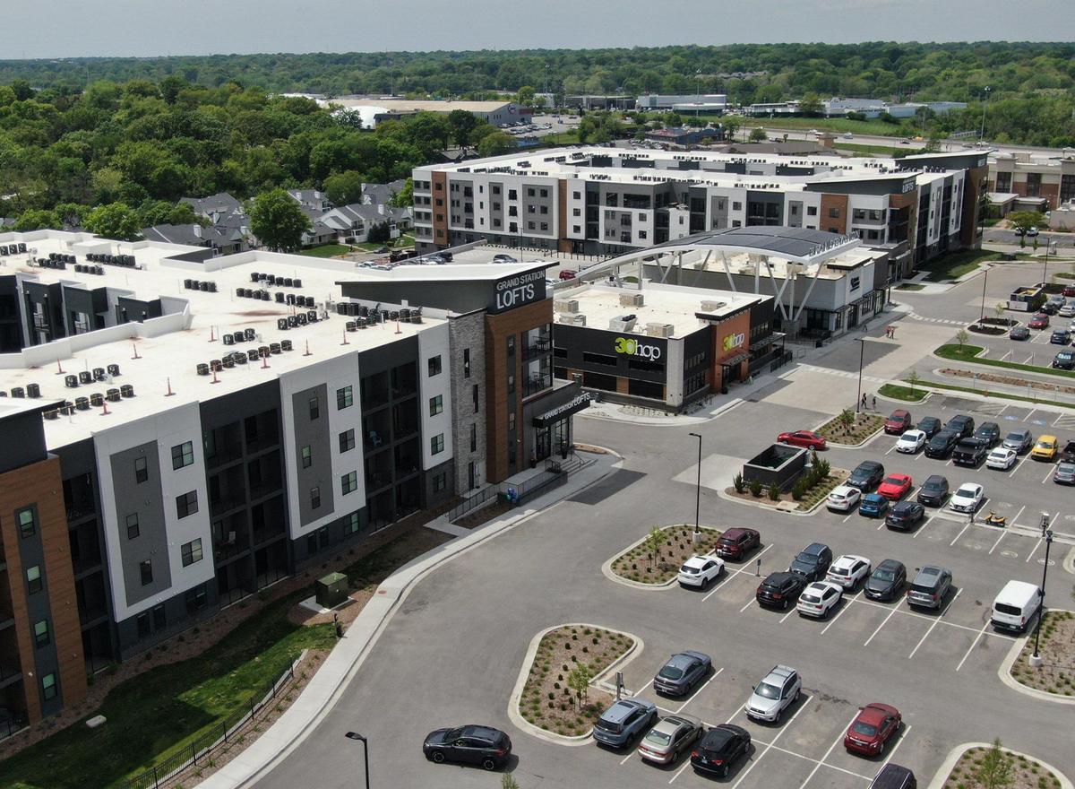 What was once a Kmart site in Merriam is now a vibrant area featuring the Grand Station Lofts luxury apartments and numerous new restaurants and other small businesses.
