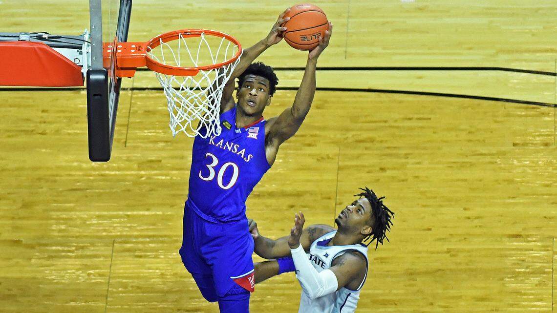Ochai Agbaji went up for two of his nine points in the Kansas Jayhawks’ victory over K-State at Bramlage Coliseum in Manhattan, Kansas on February 17, 2021.